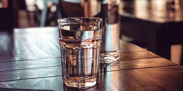 glass of water on a table